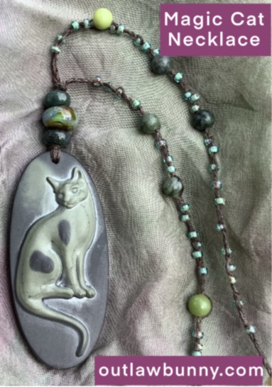 a magic cat amulet necklace